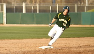 Baylor junior outfielder Adam Toth rounds second base in Baylor’s 9-3 victory over Houston Baptist on Tuesday at Baylor Ballpark.
