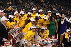 The Lady Bears celebrate after winning their fourth straight Big 12 title.