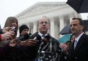 Paul Clement, attorney for Hobby Lobby and Conestoga Wood, center, stands with attorney David Cortman, right, as they speak to reporters in front of the Supreme Court in Washington, Tuesday, March 25, 2014, after the court heard oral arguments in the challenges of President Barack Obama's health care law requirement that businesses provide their female employees with health insurance that includes access to contraceptives. Supreme Court justices are weighing whether corporations have religious rights that exempt them from part of the new health care law that requires coverage of birth control for employees at no extra charge. (AP Photo/Charles Dharapak)