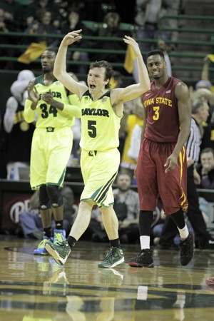 Senior guard Brady Heslip celebrates after sinking a three in the second half of Baylor's 74-61 win against Iowa State. Travis Taylor | Lariat Photo Editor