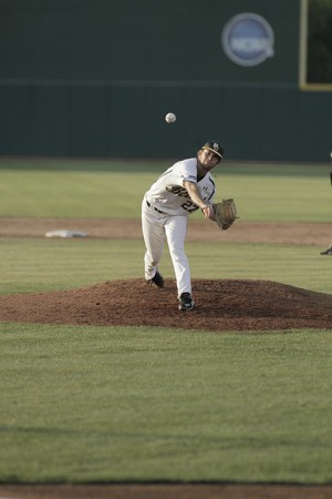 Sophomore pitcher Drew Tolson releases a pitch in Baylor’s 4-3 win over Texas State on Tuesday at Baylor Ballpark. 