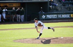 Senior right-handed pitcher Dillon Newman follows through on a pitch against UCLA on Feb. 23 at Baylor Ballpark.  Travis Taylor | Lariat Photographer