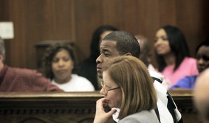 Family members of former Baylor football player Tevin Elliot wait for the judge to reach a decision on his motion for a retrial on Friday, April 4, 2014 at the Waco Courthouse.  Travis Taylor | Lariat Photo Editor