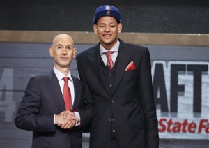 Baylor center Isaiah Austin, right, poses for a photo with NBA Commissioner Adam Silver after being granted ceremonial first round pick during the 2014 NBA draft, Thursday, June 26, 2014, in New York. Austin, who was projected to be a first round selection was diagnosed with Marfan syndrome just four days before the draft.  Jason DeCrow|Associated Press