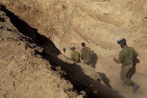  In this Sunday, Oct. 13, 2013 file photo, Israeli soldiers enter a tunnel discovered near the Israel Gaza border. They’ve been dubbed “lower Gaza,” compared to the Underground, the Metro or the subway and depicted as a bone-chilling, strategic threat to Israel.  Tsafrir Abayov|Associated Press