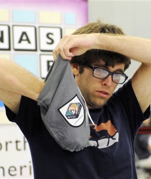 Conrad Bassett-Bouchard of Portland, national Scrabble champion, draws a game piece during the 25th National Scrabble Championship.Associated Press