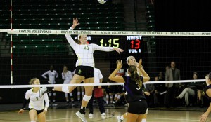 By Cody Soto Sports Writer Baylor volleyball (9-2) took a 3-1 win over Northwestern State at the Ferrell Center Tuesday night in its first home match since the team’s 3-1 win over Rice on Sept. 2. The 4-set win (25-20, 27-29, 25-22, 25-19) was Baylor’s fifth consecutive win over the Demons. The Bears now lead the all-time series 5-0. Baylor had also defeated Northwestern State in four sets during the 2013 season. “We knew that they were ready to play us, and we just didn’t start out playing our game,” junior setter Amy Rosenbaum said. “Once we got out of our heads, we were able to play the right way. It was really a team effort towards the end of the match.” Junior outside hitter Andie Malloy had a double-double with 15 kills and 17 digs for the Bears, followed by freshman outside hitter Katie Staiger with 15 kills, sophomore middle hitter Sam Hill with eight, and junior outside hitter Laura Jones with six kills and 13 digs in the 4-set win. Jones and Hill received a significant amount of playing time in Tuesday’s match. Jones had only played in two games prior to the match, and Hill was listed as a redshirt sophomore coming into the season. “It was so much fun getting out there and playing volleyball tonight,” Hill said. “The lineup is constantly changing, but everyone really stepped in and played the role that we were given.” Junior setter Amy Rosenbaum led all players with 47 assists in Tuesday’s win. Senior libero Hope Ogden helped Baylor’s back row with 18 digs. Rosenbaum and Jones added 13 digs to the Bears’ 82 digs on the night.  Freshman libero Jana Brusek also contributed with 10 digs for Baylor. The Bears’ 13 blocks overtook the match with Jones’s five blocks along with sophomore middle hitter Tola Itiola’s four blocks. Baylor ended the match with a .195 hitting percentage opposed to Northwestern State’s .103 effort. The Bears got off to a shaky 0-3 start before tying up the game at 6-6 and surging on a 6-2 run to pull ahead for the rest of the set. The Demons (3-7) managed a 4-0 and 3-0 run to cut the Bears’ lead late in the set, but Baylor took the set with five straight points.  Staiger finished the set with a kill to give Baylor the 25-20 set win. “Northwestern State really put the pressure on us and they were a strong defensive team,” Staiger said. “We had to be ready for the long rallies because their defense was so strong.” The Bears took a 6-4 lead early in the second set before Northwestern State came from behind and tied it up 8-8. Both teams stayed close to each other and the lead did not go over three.   Northwestern State called a timeout behind back-to-back kills by Malloy and managed to shake off three set points before stealing the second set 29-27. The Bears came out of the locker room hot and started out neck-and-neck with the Demons early in the third set. Baylor used a 5-1 run to give the team some breathing room and forced a Northwestern State timeout. A big block at the net by Baylor forced another timeout after leading 22-17 in the set. The Bears were then held to three set points before taking the third set 25-22. Baylor was able to use a .387 hitting effort to surge ahead in the fourth set and led 13-5 early. Northwestern State was able to use small runs to stay in the game, but it wasn’t enough for the Demons.  The Bears took control of the final points of the set and won the fourth set 25-19 behind a kill by senior outside hitter Nicole Bardaji to take the match 3-1. “Overall, it was a very in-and-out game and we were out of focus at times and allowed Northwestern State back in. We won, but it wasn’t the effort that we wanted to see,” head coach Jim Barnes said. “Northwestern State passed and served really tough, so it kept us on our heels.” Baylor will rest its five-game win streak before travelling to San Antonio and playing its final non-conference tournament this weekend.  The Bears will face LSU at noon on both Friday and Saturday, and finish with a match against UTSA at 5 p.m. All matches will be played at the Convocation Center in San Antonio.Skye Duncan | Lariat Photographer