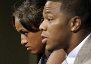 Janay Rice looks on as Ray Rice speaks in May to the media during a news conference about hitting his wife.Associated Press