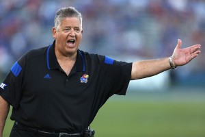 Kansas head coach Charlie Weis argues with an official after a penalty was called on his team during a game against Southeast Missouri State in the second quarter of an NCAA football game Saturday, Sept. 6, 2014, in Lawrence, Kan.Ed Zurga | Associated Press