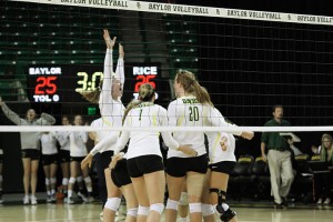 Baylor volleyball celebrates winning a point on Sept. 2 at the Ferrell Center against Rice. The Bears defeated the Rice Owls 3-1 in the intra-state matchup.Skye Duncan | Lariat Photographer