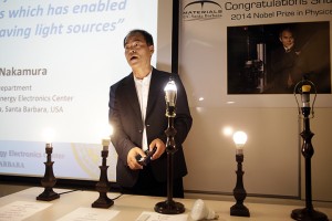 Scientist Shuji Nakamura, a Japanese-born American professor at the University of California, Santa Barbara, demonstrates LED lights during a news conference, Tuesday, Oct. 7, 2014, in Santa Barbara, Calif. Nakamura and two Japanese scientists won the Nobel Prize in physics on Tuesday for inventing blue light-emitting diodes, a breakthrough that has spurred the development of LED technology to light up homes, computer screens and smartphones worldwide.Associated Press