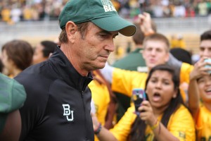 Baylor coach Art Briles walks into McLane Stadium on Oct. 11 against TCU. The Bears overcame a late victory to win 61-58 but could not do the same against West Virginia. Skye Duncan | Lariat Photographer