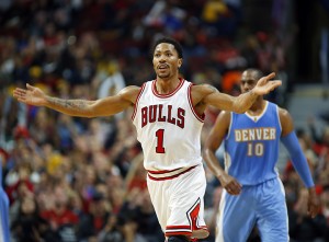 Chicago Bulls guard Derrick Rose (1) reacts to the crowd on Oct. 13, after making a three-point basket against the Denver Nuggets during the first half of a pre-season NBA basketball game in Chicago.Jeff Haynes | Associated Press