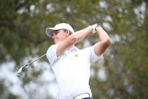 Senior Mikkel Bjerch-Andresen swings on Tuesday during the Royal Oaks Invitational. Bjerch-Andresen won the event with a six-under-par.Matt Minard | Baylor Photography