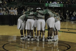 Baylor women’s basketball huddles together before its Jan. 29 game against the Texas Tech Red Raiders in Waco. The Lady Bears defeated the Red Raiders 92-43 at the Ferrell Center. The Lady Bears prepare to open their 2014-15 campaign on Tuesday.Lariat File Photo