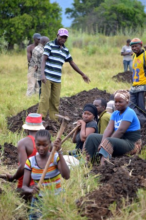 The villagers of Toloha, Tanzania dig a trench that will run a pipe up the Pare Mountains. The nonprofit organization Toloha Partnership provided the pipes that will deliver water based on a gravity-fed system.Courtesy of Joshua Spear