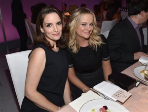 Tina Fey (left) and Amy Poehler will host the Golden Globes for the third and final time in 2015.Associated Press