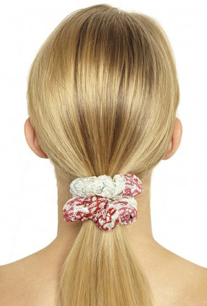 Scrunchies, a popular ’90s hair accessory, is making a comeback, fashion experts say. High-end brands like Chanel and Marc Jacobs are even in on the trend.Tribune News Service