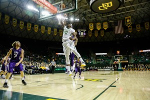 No. 00 senior forward Royce O'Neale goes up for a layup against Stephen F. Austin Monday night at the Ferrell Center.Skye Duncan | Lariat Photographer