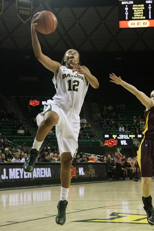 Sophomore guard Alexis Prince (12) goes up for a layup during Baylor's 99-56 win over MSU. Skye Duncan | Lariat Photographer