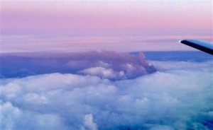 In this photo taken Friday by the Alaska Volcano Observatory, the Pavlof volcano’s eruption plume is seen from an aircraft. The National Weather Service warned airplanes to avoid airspace near the erupting volcano as it spewed ash 30,000 feet above sea level.Associated Press