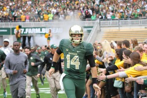 Senior quarterback Bryce Petty runs on the field before Baylor’s Oct. 11 game against TCU at McLane Stadium. The Bears defeated the Horned Frogs 61-58 to stay in the College Football Playoff picture. Skye Duncan | Lariat Photographer