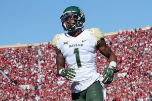 Sophomore wide receiver Corey Coleman runs onto the field before Baylor’s matchup with the Oklahoma Sooners on Saturday. Coleman caught 15 balls for 225 yards in BU’s 48-14 win, both career highs.Kevin Freeman | Lariat Photographer