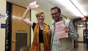 Lauren Scott and Keith Mazanec react after casting their ballot early Wednesday morning at one of Chicago’s same-day registration polling locations.Associated Press
