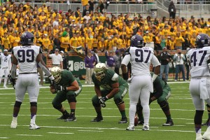 Baylor offensive lineman Troy Baker (left), Jarrell Broxton (center) and Kyle Fuller line up for a snap against TCU on Oct. 11. The Bears beat the Horned Frogs 61-58, but lost right guard Desmine Hilliard for the season. Kevin Freeman | Lariat Photographer
