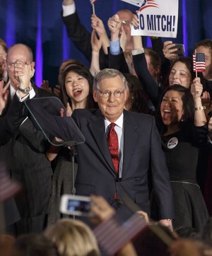 Senate Minority Leader Mitch McConnell, R-Ky., celebrates Tuesday with his supporters at an election night party in Louisville, Ky.Associated Press