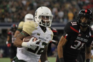 Sophomore running back Shock Linwood runs for a gain during Baylor's 48-46 win over Texas Tech on Saturday.Skye Duncan | Lariat Photographer