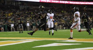 Sophomore running back Shock Linwood (32) runs for a touchdown during Baylor's 49-28 win over Oklahoma State on Saturday.Constance Atton | Lariat Photographer