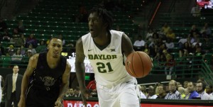 Junior forward Taurean Prince dribbles by a defender during Baylor's 60-45 win over Prairie View A&M on FridayConstance Atton | Lariat Photographer