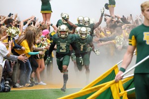Sophomore cornerback Tion Wright (3) and junior cornerback Chris Sanders (1) run out of the tunnel before Baylor’s 61-58 win over No. 9 TCU on Oct. 11. The Bears will face the No. 15 Oklahoma Sooners on Saturday. Skye Duncan | Lariat Photographer