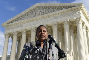 Paulette Sullivan Moore, vice president of Public Policy at the National Network to End Domestic Violence, speaks to reporters Monday outside the Supreme Court in Washington.Associated Press