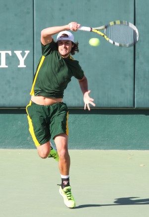 No. 121 Felipe Rios returns the ball on a serve during Baylor's 4-0 victory over Drake University.Skye Duncan | Lariat Photo Editor
