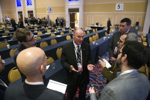 Jim Delany, Big Ten Commissioner,  speaks with reporters at the NCAA's Autonomy Business Session during the final day of the NCAA Convention in Oxon Hill, Md., Saturday, Jan. 17, 2015. The five most powerful and wealthiest conferences in college sports passed NCAA legislation that increases the value of an athletic scholarship by several thousand dollars to cover the federally determined actual cost of attendance. (AP Photo/Cliff Owen)