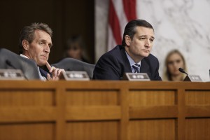 Senate Judiciary Committee members, Sen. Ted Cruz, R-Texas, right, and Sen. Jeff Flake, R-Ariz., listen to answers from Attorney General nominee Loretta Lynch, President Barack Obama's choice to run the Justice Department, as she appears before the committee for her confirmation hearing, Wednesday, Jan. 28, 2015, on Capitol Hill in Washington. This is the first nomination hearing under the new Republican majority.  (AP Photo/J. Scott Applewhite)