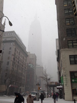 Snow falls Monday on downtown New York City near the Empire State Building. (Photo courtesy of Annie Carr)