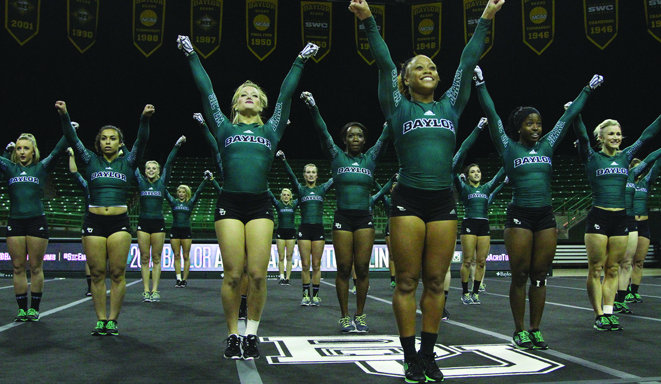 The Baylor acrobatics and tumbling team performs its team routine during its season-opening triple meet against Quinnipiac and Concordia. The team set an attendance record with 1,453 fans filling the Ferrell Center last Saturday.Hannah Haseloff | Lariat Photographer
