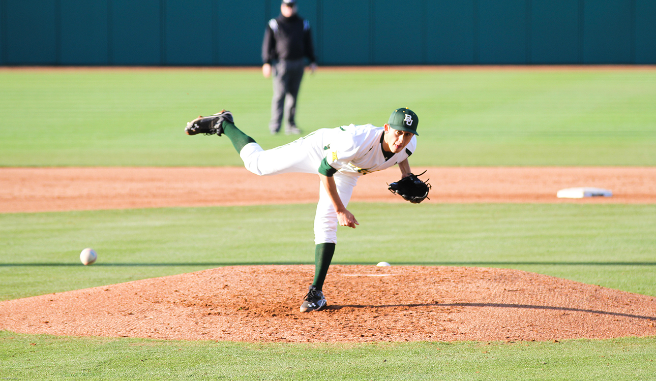 No. 33 junior pitcher Theron Kay throws a pitch during Baylor's 8-4 win over Northwestern State on Wednesday. Skye Duncan | Lariat Photo Editor