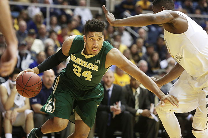 Baylor guard/forward Ishmail Wainright (24) drives during Baylor's 87-69 win in Morgantown, W.Va., on Saturday. Associated Press