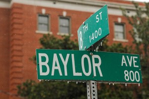 Icicles hang off street signs at 8th and Baylor.  Kevin Freeman | Lariat Photographer 