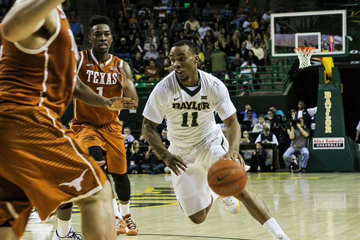 Junior guard Lester Medford drives down the lane during Baylor’s 83-60 win over Texas on Saturday. Medford dished seven assists in the win.Kevin Freeman | Lariat Photographer