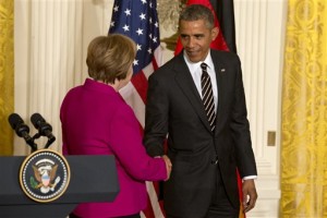 President Barack Obama shakes hands with German Chancellor Angela Merkel after their joint news conference in the East Room of the White House in Washington, Monday, Feb. 9, 2015. The leaders were expected to discuss the ongoing conflict in Ukraine, and arming Ukrainian fighters to wage a more effective battle against Russian-backed separatists. (AP Photo/Jacquelyn Martin)