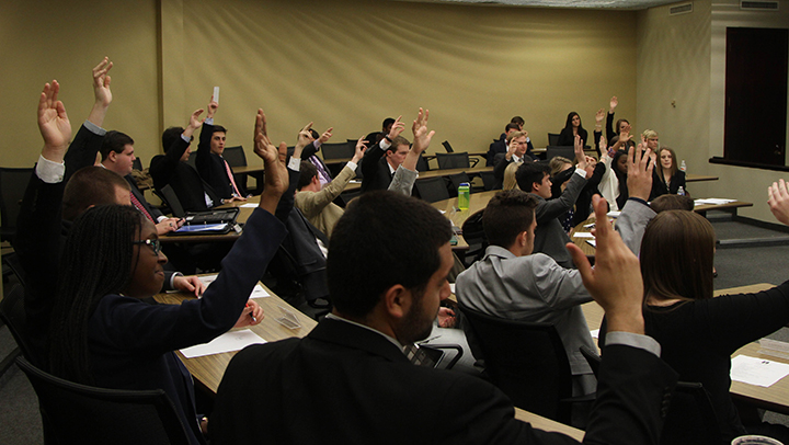 In this photo from Jan. 29, senators vote to send a measure concerning campus Wi-Fi to student body president Dominic Edwards. Student Senate voted Tuesday not to ask Woodinville, Wash., senior Gannon McCahill to resign and recently amended their bylaws to limit media accessibility.