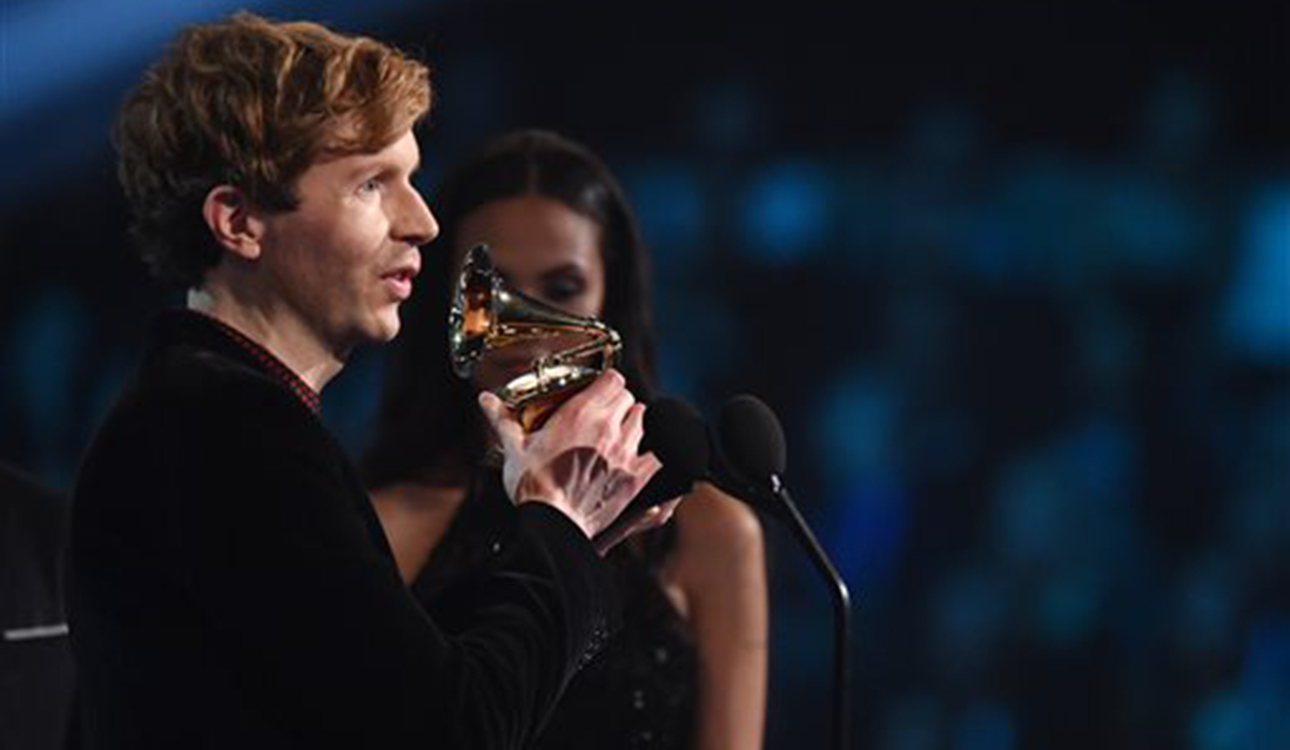 Singer Beck accepts an award for best rock album at the 57th annual Grammy Awards on Sunday evening. Beck was the subject of a near-repeat of Kanye’s 2009 VMA stunt with Taylor Swift.Associated Press