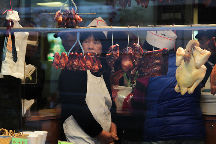 Chinatown had lots of stores full of souvenirs, and they also sold food including freshly cooked meats.
