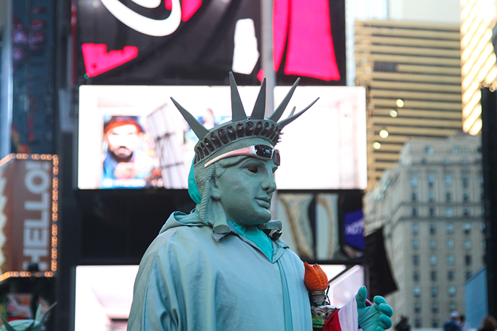 People dressed up in all sorts of outfits in Times Square including the Statue of Liberty on stilts. Other costumes included Minnie Mouse, Captain America and Spiderman.