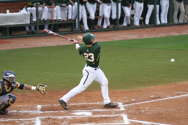 Sophomore catcher Matt Menard swings during Baylor baseball’s 10-4 win over West Virginia on Saturday. Despite having five at-bats, Menard finished hitless. Baylor won the series over the West Virginia Mountaineers 2-1 after topping WVU on Friday and Saturday.  Skye Duncan | Lariat Photo Editor